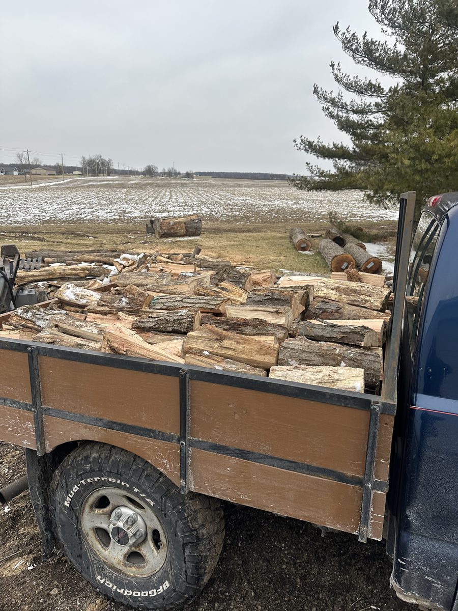 Truck bed loaded with hardwood firewood ready for delivery — Vail Wood Products, Butler, Indiana
