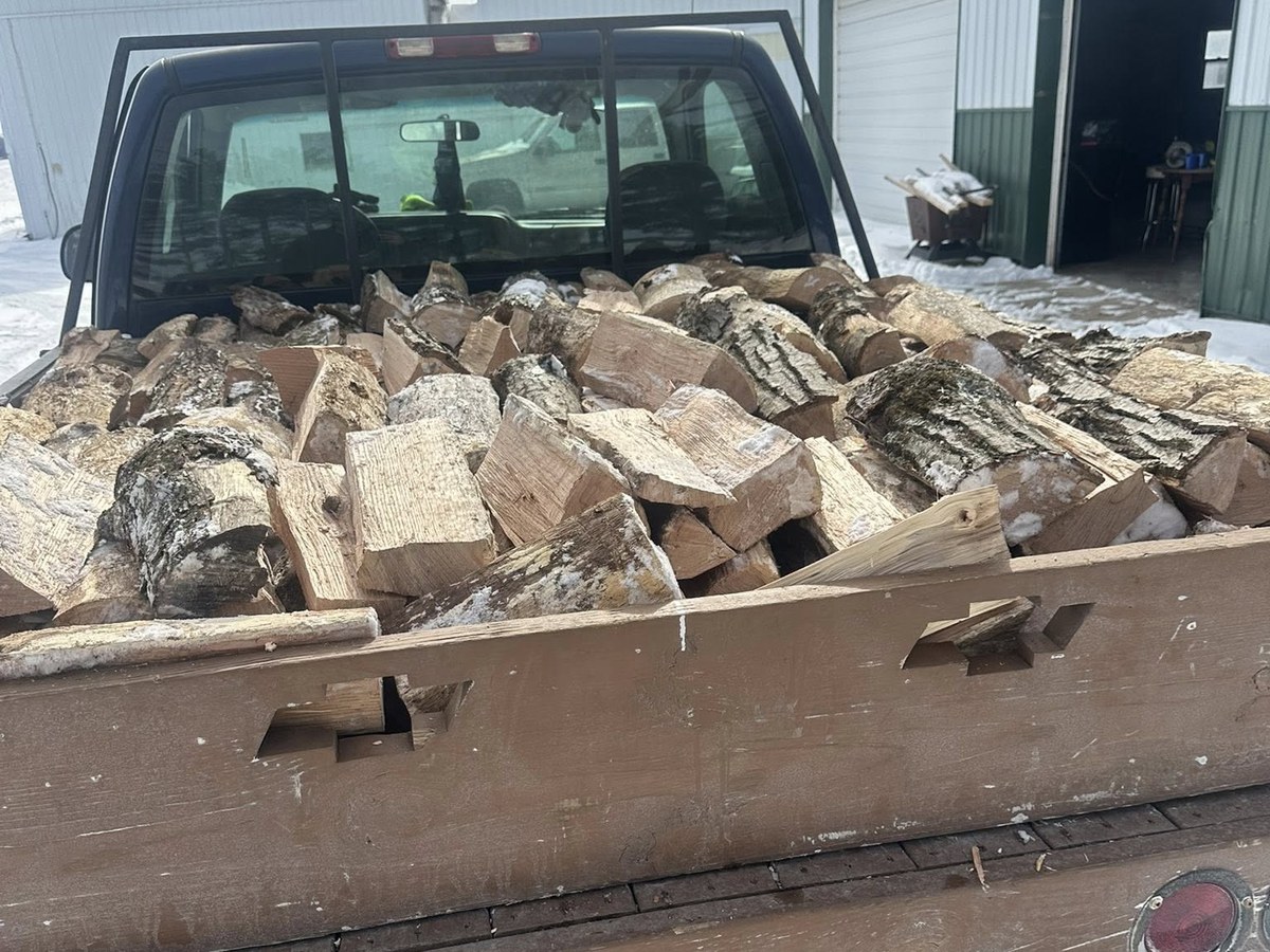Truck bed loaded with split hardwood firewood ready for delivery — Vail Wood Products, Butler, Indiana